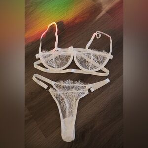 two-piece lingerie set in a crisp white color size medium